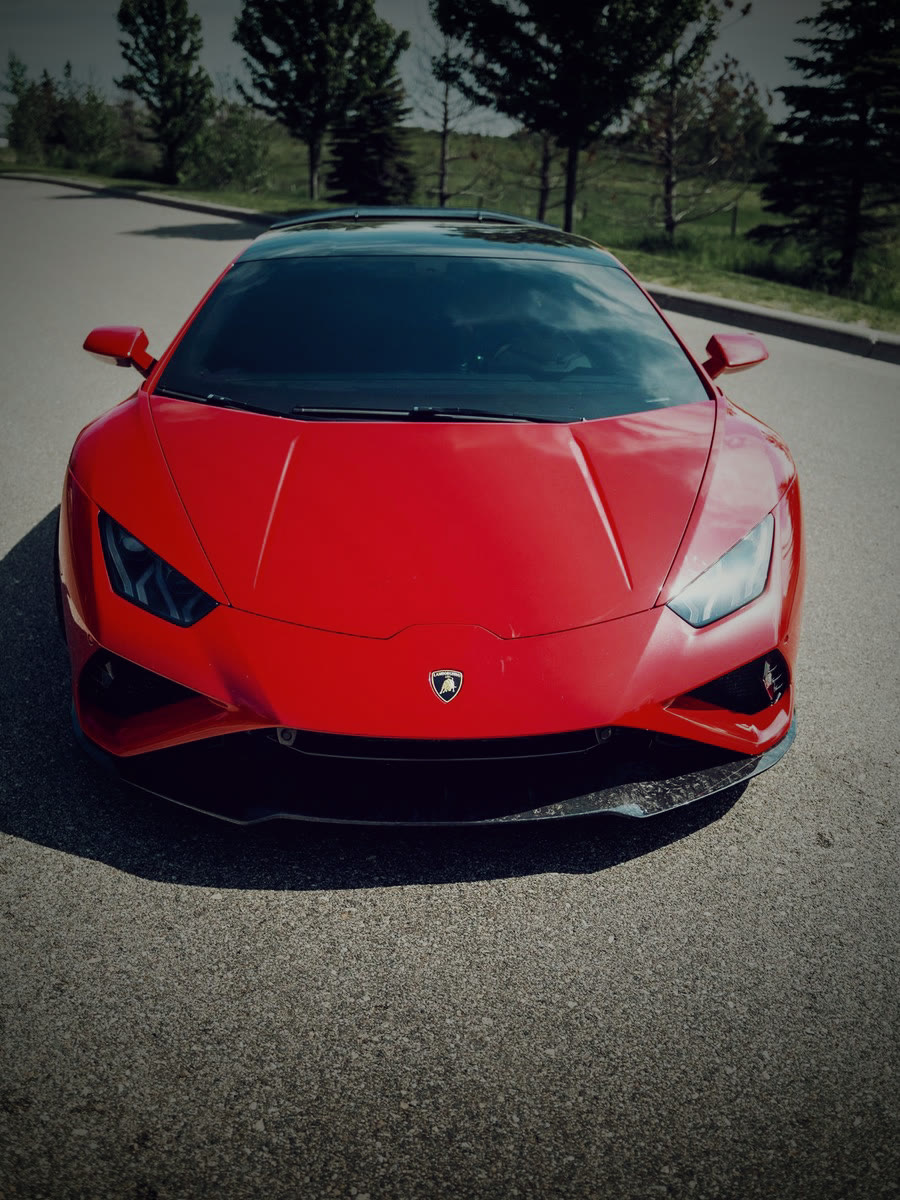 Red Lamborghini Huracán EVO with forged carbon wing