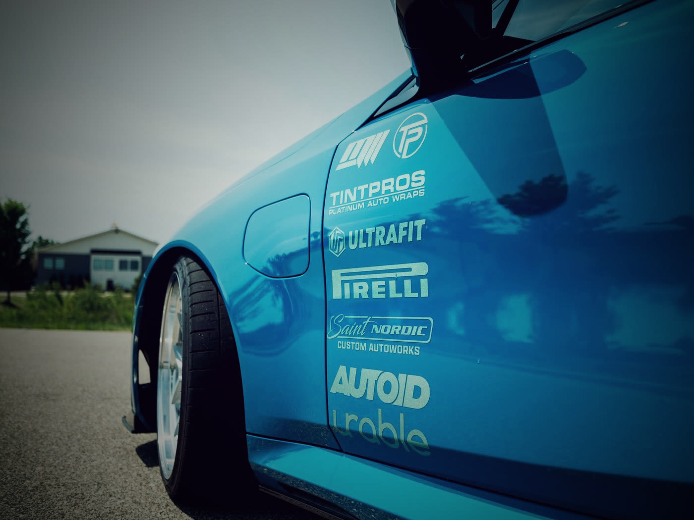 Slammed BMW M5 with tucked wheel and aftermarket suspension